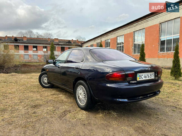 Синий Мазда Кседос 6, объемом двигателя 2 л и пробегом 300 тыс. км за 2250 $, фото 21 на Automoto.ua