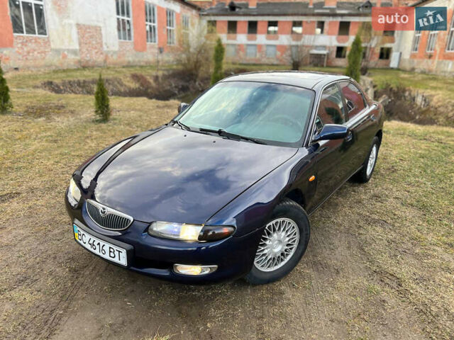 Синий Мазда Кседос 6, объемом двигателя 2 л и пробегом 300 тыс. км за 2250 $, фото 17 на Automoto.ua