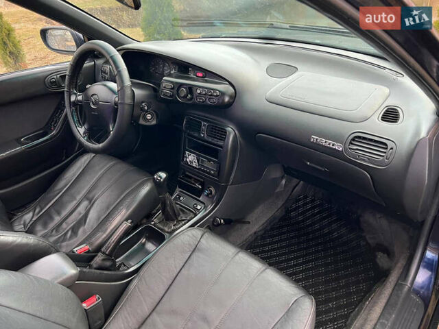 Синий Мазда Кседос 6, объемом двигателя 2 л и пробегом 300 тыс. км за 2250 $, фото 41 на Automoto.ua