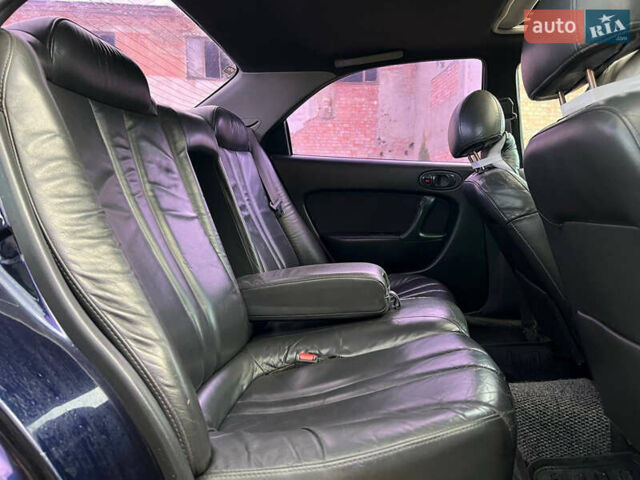 Синий Мазда Кседос 6, объемом двигателя 2 л и пробегом 300 тыс. км за 2250 $, фото 40 на Automoto.ua