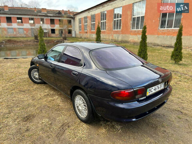 Синий Мазда Кседос 6, объемом двигателя 2 л и пробегом 300 тыс. км за 2250 $, фото 24 на Automoto.ua