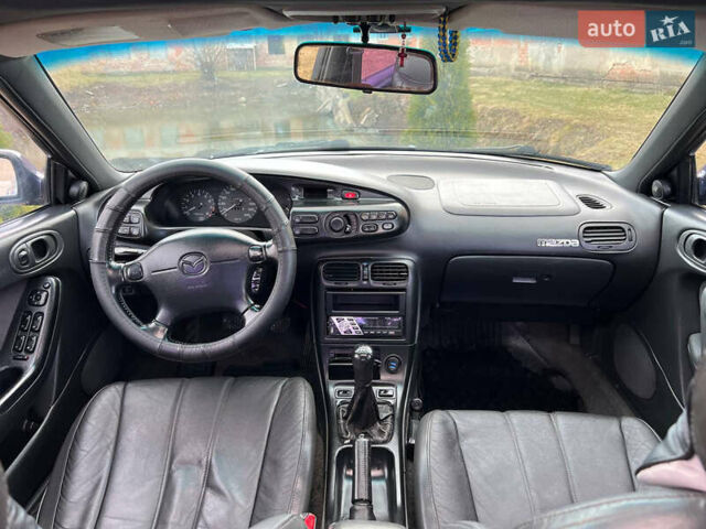 Синий Мазда Кседос 6, объемом двигателя 2 л и пробегом 300 тыс. км за 2250 $, фото 44 на Automoto.ua