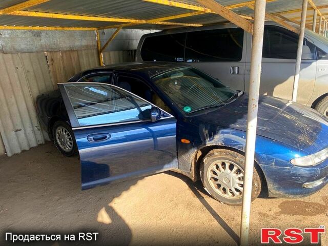 Синий Мазда Кседос 6, объемом двигателя 2 л и пробегом 134 тыс. км за 1300 $, фото 3 на Automoto.ua