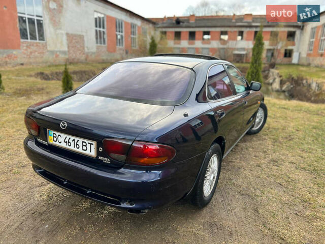 Синий Мазда Кседос 6, объемом двигателя 2 л и пробегом 300 тыс. км за 2250 $, фото 34 на Automoto.ua