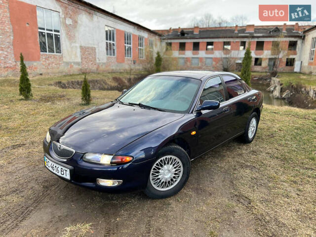 Синий Мазда Кседос 6, объемом двигателя 2 л и пробегом 300 тыс. км за 2250 $, фото 14 на Automoto.ua