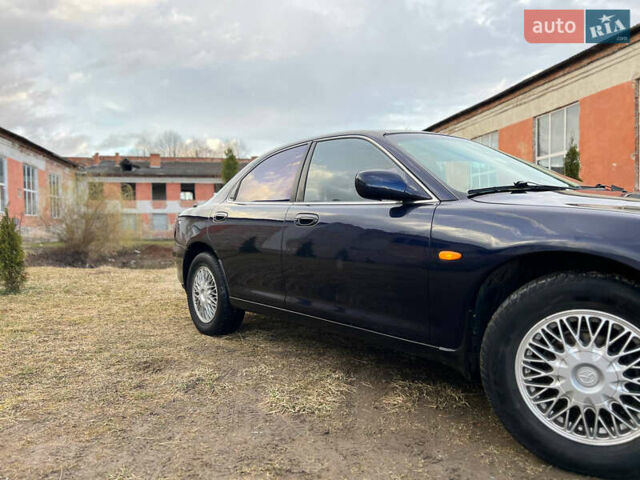 Синий Мазда Кседос 6, объемом двигателя 2 л и пробегом 300 тыс. км за 2250 $, фото 9 на Automoto.ua