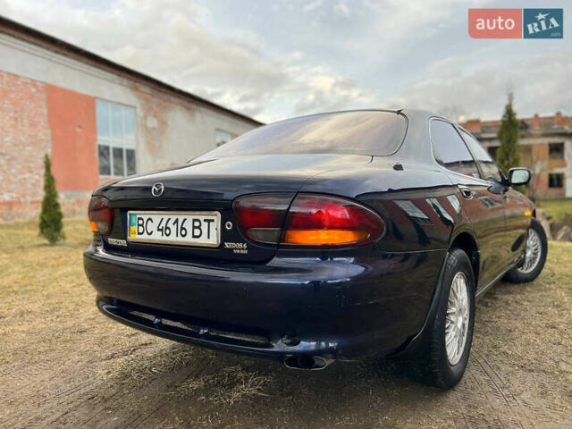 Синий Мазда Кседос 6, объемом двигателя 2 л и пробегом 300 тыс. км за 2250 $, фото 32 на Automoto.ua