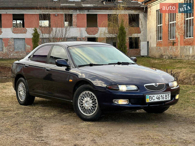 Синий Мазда Кседос 6, объемом двигателя 2 л и пробегом 300 тыс. км за 2250 $, фото 3 на Automoto.ua