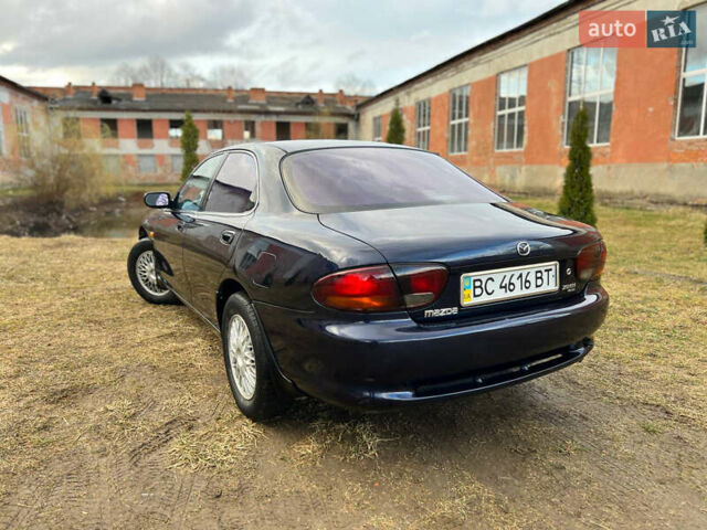 Синий Мазда Кседос 6, объемом двигателя 2 л и пробегом 300 тыс. км за 2250 $, фото 25 на Automoto.ua