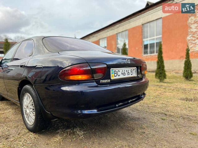 Синий Мазда Кседос 6, объемом двигателя 2 л и пробегом 300 тыс. км за 2250 $, фото 26 на Automoto.ua