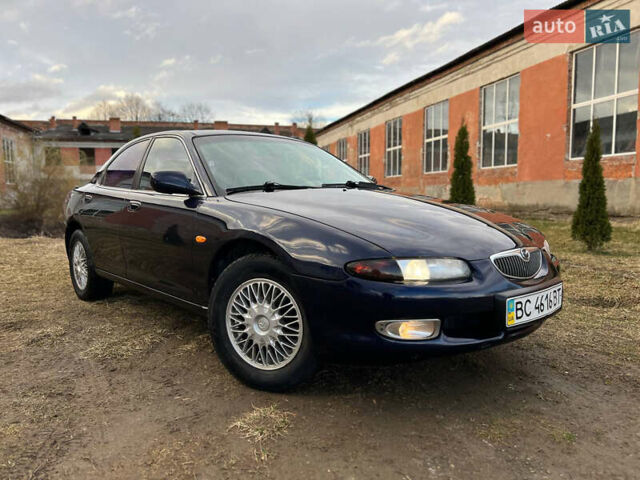 Синий Мазда Кседос 6, объемом двигателя 2 л и пробегом 300 тыс. км за 2250 $, фото 7 на Automoto.ua