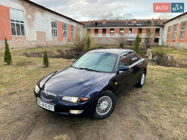 Синий Мазда Кседос 6, объемом двигателя 2 л и пробегом 300 тыс. км за 2250 $, фото 20 на Automoto.ua