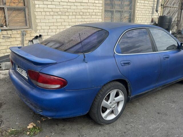 Синий Мазда Кседос 6, объемом двигателя 2 л и пробегом 290 тыс. км за 650 $, фото 3 на Automoto.ua