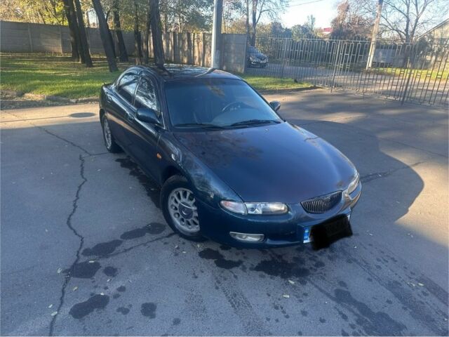 Зелений Мазда Кседос 6, об'ємом двигуна 2 л та пробігом 3 тис. км за 3200 $, фото 1 на Automoto.ua