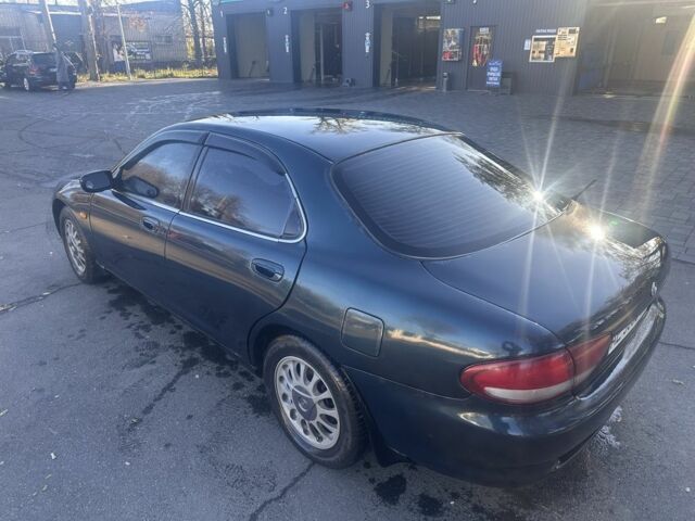 Зелений Мазда Кседос 6, об'ємом двигуна 2 л та пробігом 3 тис. км за 3200 $, фото 3 на Automoto.ua