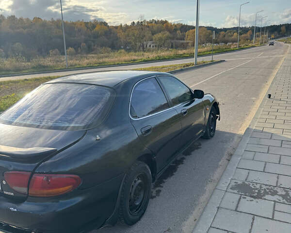 Зеленый Мазда Кседос 6, объемом двигателя 2 л и пробегом 230 тыс. км за 1350 $, фото 6 на Automoto.ua