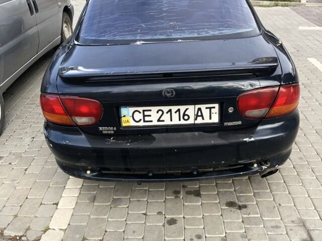 Зелений Мазда Кседос 6, об'ємом двигуна 2 л та пробігом 243 тис. км за 1100 $, фото 4 на Automoto.ua