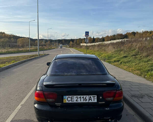 Зеленый Мазда Кседос 6, объемом двигателя 2 л и пробегом 230 тыс. км за 1350 $, фото 5 на Automoto.ua