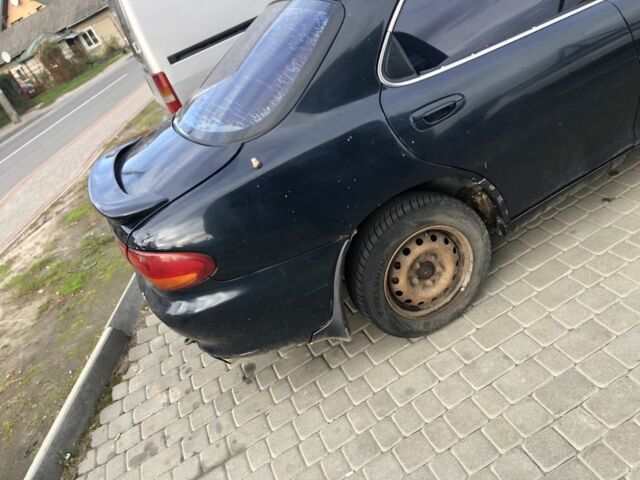 Зелений Мазда Кседос 6, об'ємом двигуна 2 л та пробігом 243 тис. км за 1100 $, фото 5 на Automoto.ua