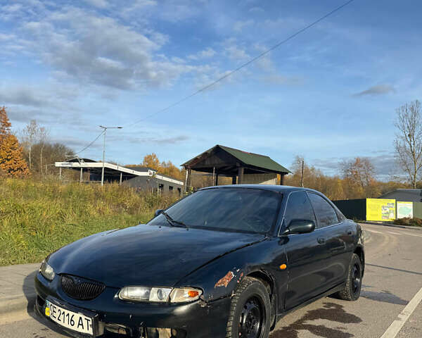 Зеленый Мазда Кседос 6, объемом двигателя 2 л и пробегом 230 тыс. км за 1350 $, фото 2 на Automoto.ua