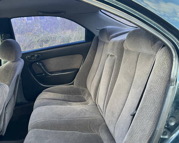 Зеленый Мазда Кседос 6, объемом двигателя 2 л и пробегом 230 тыс. км за 1350 $, фото 8 на Automoto.ua