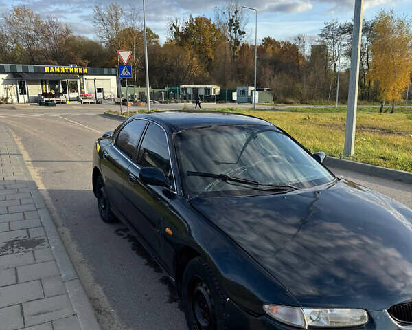 Зеленый Мазда Кседос 6, объемом двигателя 2 л и пробегом 230 тыс. км за 1350 $, фото 1 на Automoto.ua