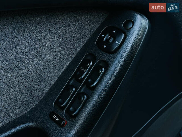 Зеленый Мазда Кседос 6, объемом двигателя 2 л и пробегом 213 тыс. км за 1900 $, фото 11 на Automoto.ua