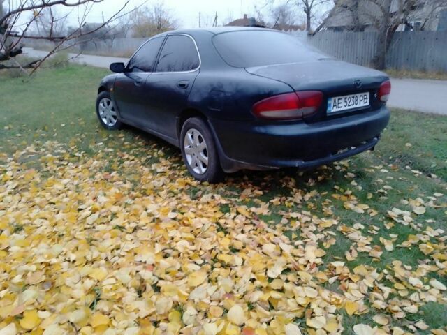 Зеленый Мазда Кседос 6, объемом двигателя 2 л и пробегом 400 тыс. км за 1500 $, фото 1 на Automoto.ua