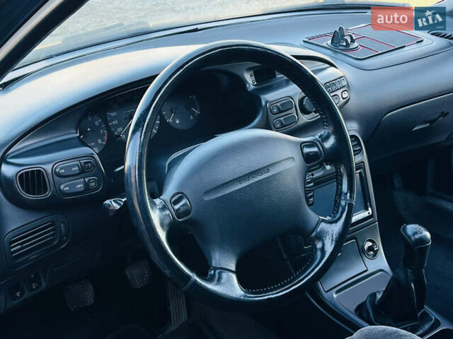 Зеленый Мазда Кседос 6, объемом двигателя 2 л и пробегом 213 тыс. км за 1900 $, фото 9 на Automoto.ua