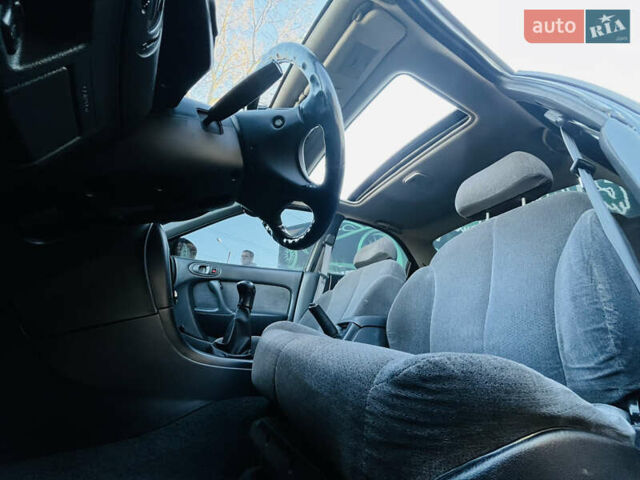 Зеленый Мазда Кседос 6, объемом двигателя 2 л и пробегом 213 тыс. км за 1900 $, фото 27 на Automoto.ua