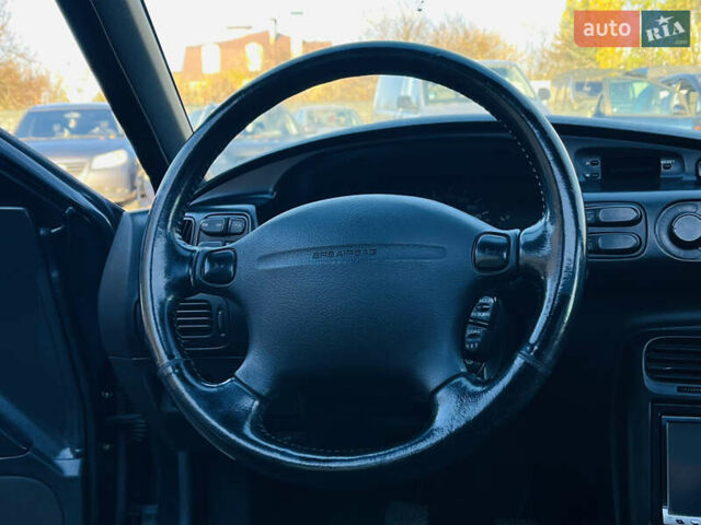 Зеленый Мазда Кседос 6, объемом двигателя 2 л и пробегом 213 тыс. км за 1900 $, фото 14 на Automoto.ua