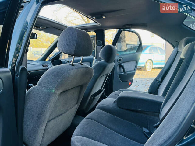 Зеленый Мазда Кседос 6, объемом двигателя 2 л и пробегом 213 тыс. км за 1900 $, фото 12 на Automoto.ua