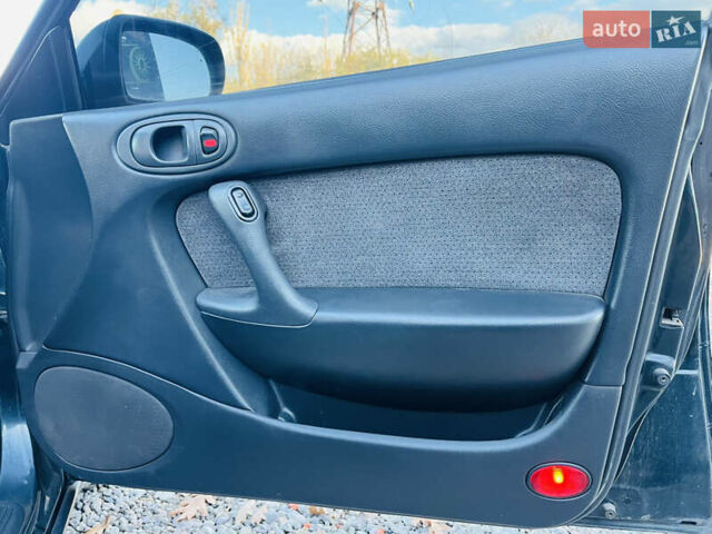 Зеленый Мазда Кседос 6, объемом двигателя 2 л и пробегом 213 тыс. км за 1900 $, фото 20 на Automoto.ua