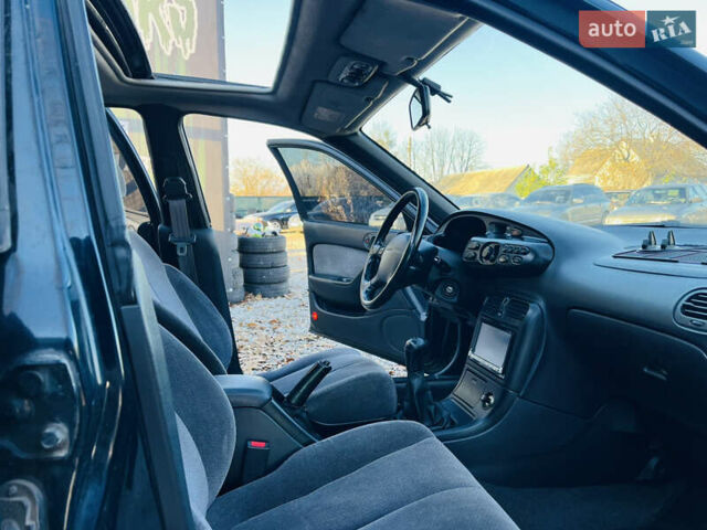 Зеленый Мазда Кседос 6, объемом двигателя 2 л и пробегом 213 тыс. км за 1900 $, фото 18 на Automoto.ua