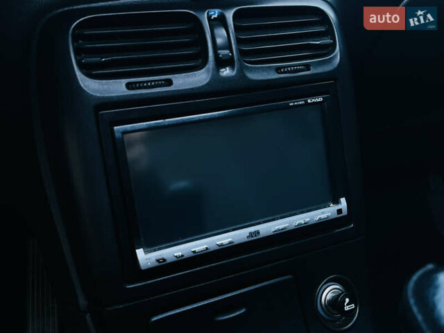 Зеленый Мазда Кседос 6, объемом двигателя 2 л и пробегом 213 тыс. км за 1900 $, фото 24 на Automoto.ua