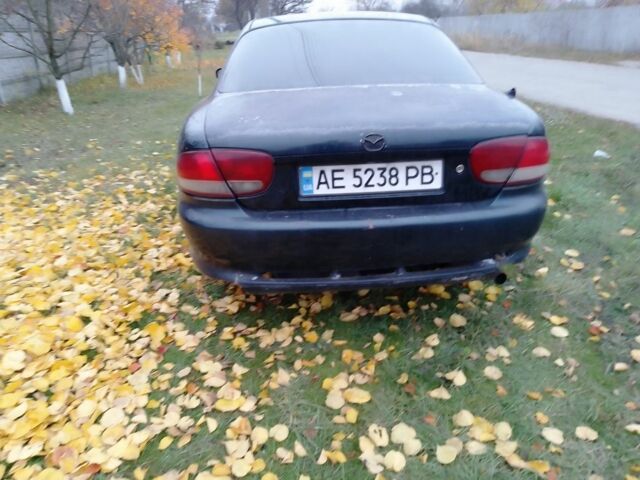 Зеленый Мазда Кседос 6, объемом двигателя 2 л и пробегом 400 тыс. км за 1500 $, фото 3 на Automoto.ua