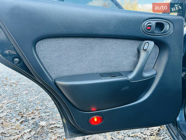 Зеленый Мазда Кседос 6, объемом двигателя 2 л и пробегом 213 тыс. км за 1900 $, фото 15 на Automoto.ua