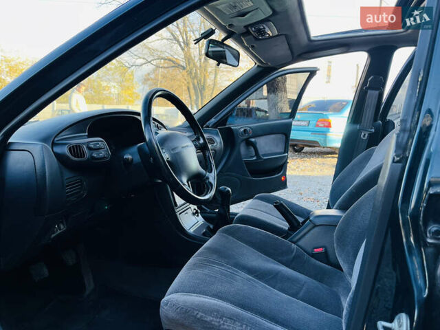 Зеленый Мазда Кседос 6, объемом двигателя 2 л и пробегом 213 тыс. км за 1900 $, фото 8 на Automoto.ua