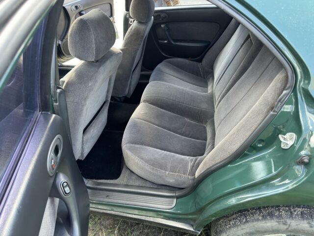 Зелений Мазда Кседос 6, об'ємом двигуна 2 л та пробігом 490 тис. км за 2000 $, фото 6 на Automoto.ua