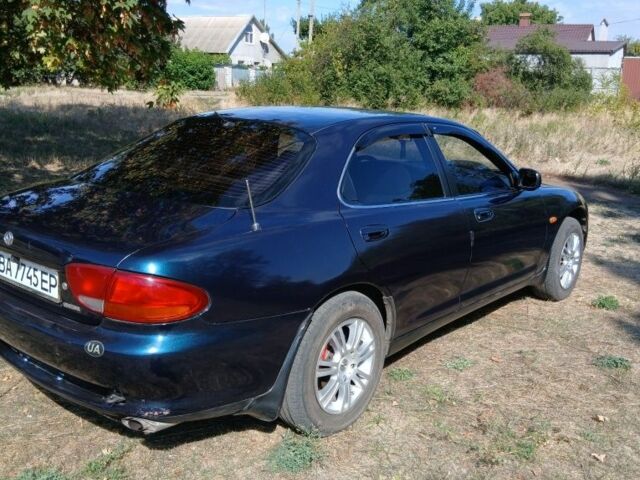 Зелений Мазда Кседос 6, об'ємом двигуна 2 л та пробігом 375 тис. км за 3100 $, фото 2 на Automoto.ua