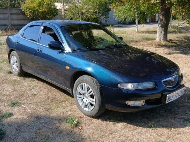 Зелений Мазда Кседос 6, об'ємом двигуна 2 л та пробігом 375 тис. км за 3100 $, фото 4 на Automoto.ua