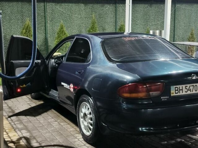 Зеленый Мазда Кседос 6, объемом двигателя 2 л и пробегом 300 тыс. км за 2600 $, фото 1 на Automoto.ua