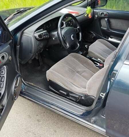 Зелений Мазда Кседос 6, об'ємом двигуна 2 л та пробігом 146 тис. км за 2800 $, фото 1 на Automoto.ua