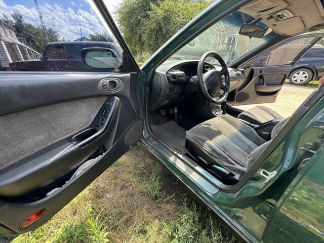 Зелений Мазда Кседос 6, об'ємом двигуна 2 л та пробігом 490 тис. км за 2000 $, фото 9 на Automoto.ua