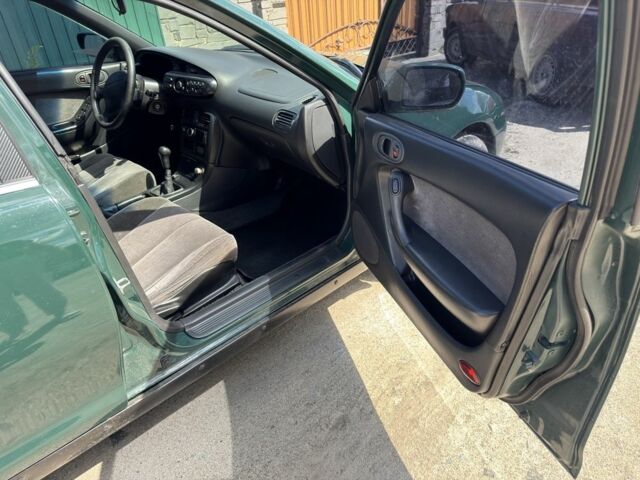 Зелений Мазда Кседос 6, об'ємом двигуна 2 л та пробігом 490 тис. км за 2000 $, фото 8 на Automoto.ua