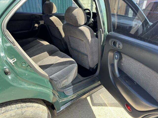 Зелений Мазда Кседос 6, об'ємом двигуна 2 л та пробігом 490 тис. км за 2000 $, фото 7 на Automoto.ua