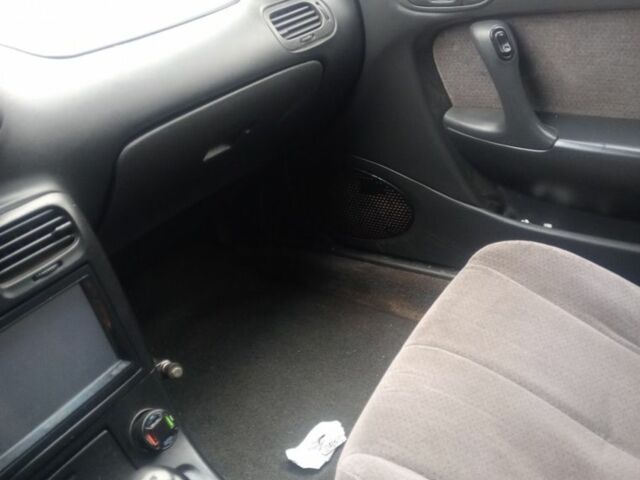 Зелений Мазда Кседос 6, об'ємом двигуна 2 л та пробігом 353 тис. км за 1700 $, фото 10 на Automoto.ua