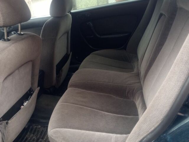 Зелений Мазда Кседос 6, об'ємом двигуна 2 л та пробігом 353 тис. км за 1700 $, фото 4 на Automoto.ua