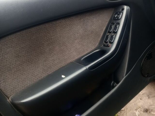 Зелений Мазда Кседос 6, об'ємом двигуна 2 л та пробігом 353 тис. км за 1700 $, фото 7 на Automoto.ua