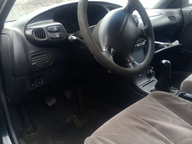 Зелений Мазда Кседос 6, об'ємом двигуна 2 л та пробігом 353 тис. км за 1700 $, фото 11 на Automoto.ua